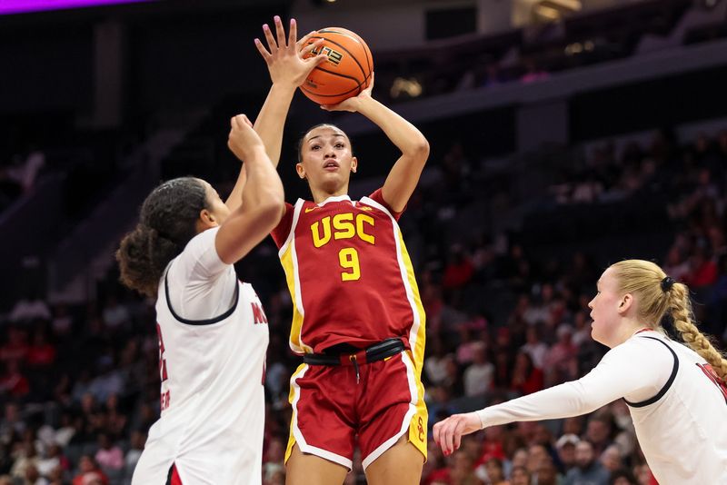 Nov 9, 2025; Charlotte, North Carolina, USA; Southern California Trojans guard Jazzy Davidson (9) shoots a basket against the NC State Wolfpack during the third quarter of the Ally Tipoff game at Spectrum Center. Mandatory Credit: Cory Knowlton-Imagn Images