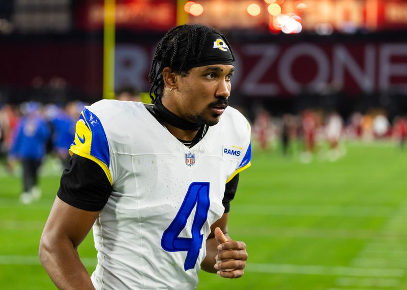 Dec 7, 2025; Glendale, Arizona, USA; Los Angeles Rams cornerback Ahkello Witherspoon (4) against the Arizona Cardinals at State Farm Stadium. Mandatory Credit: Mark J. Rebilas-Imagn Images