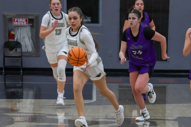 Foothill guard Emili Jimenez pushes the pace on a Cougar fastbreak in a game against Shasta. Foothill defeated the Wolves 74-71 in double overtime on Tuesday, Jan. 13, 2026.