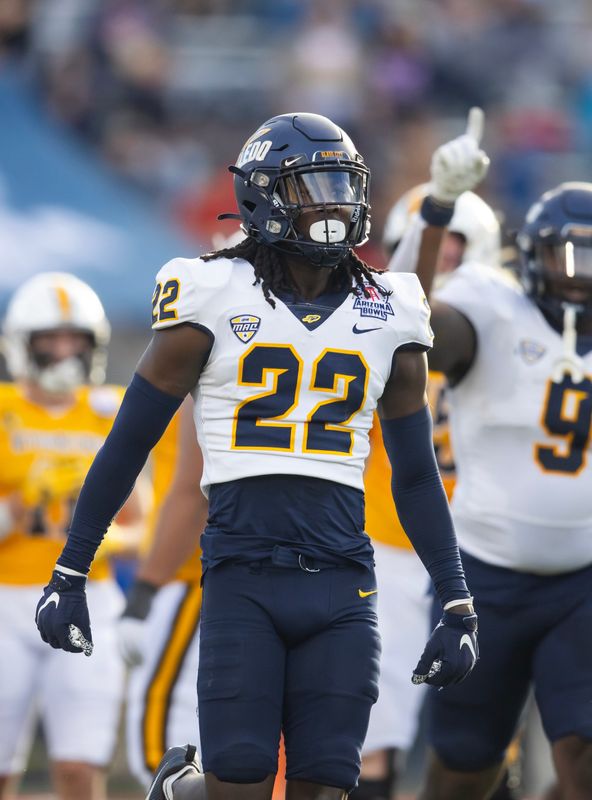 Dec 30, 2023; Tucson, AZ, USA; Toledo Rockets safety Emmanuel McNeil-Warren (22) against the Wyoming Cowboys in the Arizona Bowl at Arizona Stadium. Mandatory Credit: Mark J. Rebilas-USA TODAY Sports