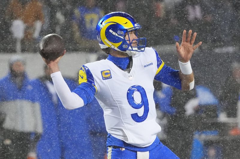 Jan 18, 2026; Chicago, IL, USA; Los Angeles Rams quarterback Matthew Stafford (9) throws a pass against the Chicago Bears during the second quarter of an NFC Divisional Round game at Soldier Field. Mandatory Credit: David Banks-Imagn Images