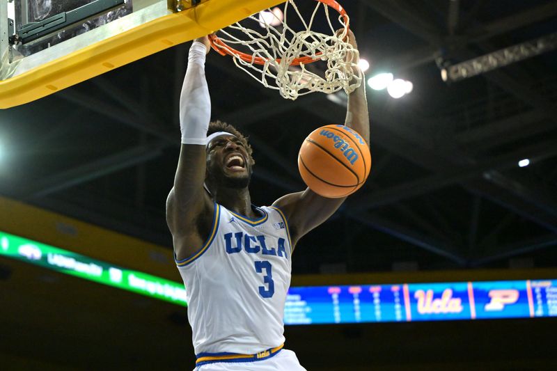 Jan 20, 2026; Los Angeles, California, USA; UCLA Bruins guard Eric Dailey Jr. (3) reacts after a dunk in the first half against the Purdue Boilermakers at Pauley Pavilion presented by Wescom Financial. Mandatory Credit: Jayne Kamin-Oncea-Imagn Images