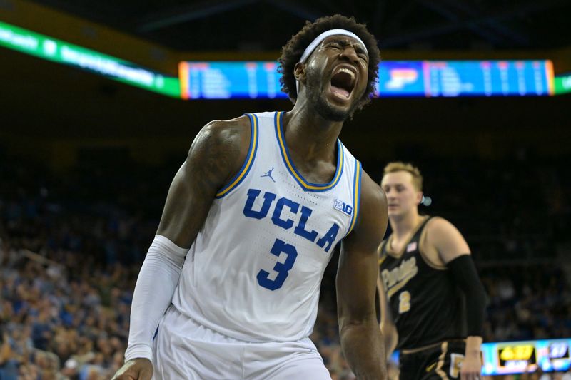 Jan 20, 2026; Los Angeles, California, USA; UCLA Bruins guard Eric Dailey Jr. (3) reacts after a dunk in the first half against the Purdue Boilermakers at Pauley Pavilion presented by Wescom Financial. Mandatory Credit: Jayne Kamin-Oncea-Imagn Images