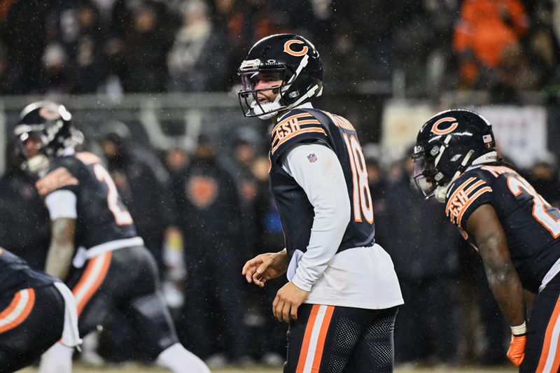 Jan 18, 2026; Chicago, IL, USA; Chicago Bears quarterback Caleb Williams (18) calls the snap count from shotgun formation against the Los Angeles Rams during the third quarter of an NFC Divisional Round game at Soldier Field. Mandatory Credit: Matt Marton-Imagn Images