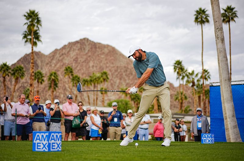 Scottie Scheffler tees off on the 11th hole during the first round of the 2026 American Express at La Quinta Country Club in La Quinta, Calif,. January 22, 2026.