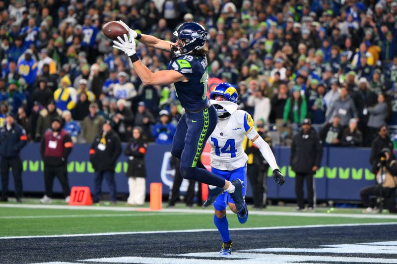 NFC championship game: Seattle Seahawks wide receiver Jake Bobo makes a catch to score a touchdown against the Los Angeles Rams in the NFC championship game at Lumen Field in Seattle. The Seahawks won the game, 31-27, to advance to Super Bowl 60.