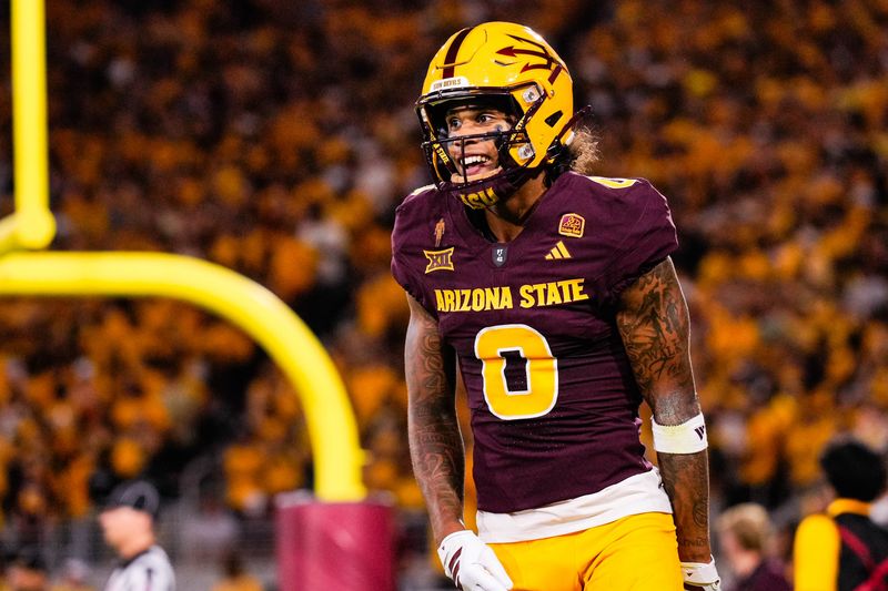 Aug 30, 2025; Tempe, Arizona, USA; Arizona State Sun Devils wide receiver Jordyn Tyson (0) celebrates his touchdown in the first quarter between Arizona State Sun Devils and Northern Arizona Lumberjacks at Mountain America Stadium. Mandatory Credit: Arianna Grainey-Imagn Images