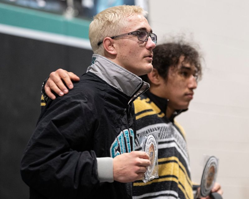 Sultana's Cael Humphrey, left, and Hesperia's Emiliano Hernandez pose for photos after being named the lower-weight and upper-weight MVP award at the Mojave River League Finals at Sultana High School on Tuesday, Jan. 27, 2026.