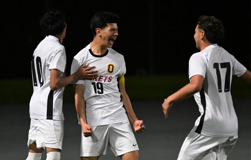 Oxnard's Justin Cruz (19) celebrates with teammates after scoring a goal against Pacifica during a Channel League soccer match on Tuesday, Jan. 27, 2026, at Pacifica High. Oxnard won, 2-0.