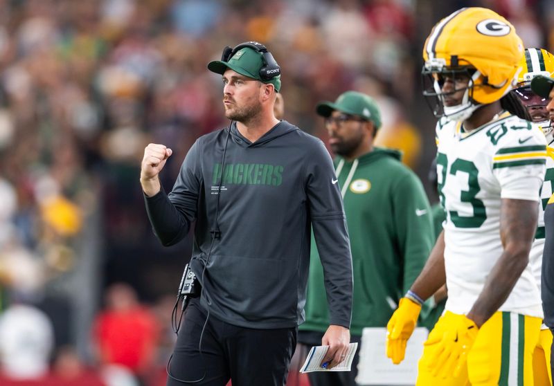 Oct 19, 2025; Glendale, Arizona, USA; Green Bay Packers quarterbacks coach Sean Mannion against the Arizona Cardinals at State Farm Stadium. Mandatory Credit: Mark J. Rebilas-Imagn Images