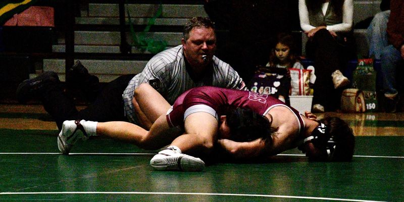 Woodlake High School principal Mike Burchett officiates a high school dual wrestling match between El Diamante and Mt. Whitney on Jan. 20, 2026 in Visalia.