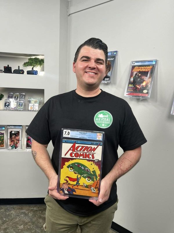 Timmy Heague, owner of comic book stores in Ventura and Newbury Park, shows the 1938 comic book that marks the first appearance of Superman. He was contracted to arrange the sale of the highly sought collectible that attracted a winning bid of $1.4 million..