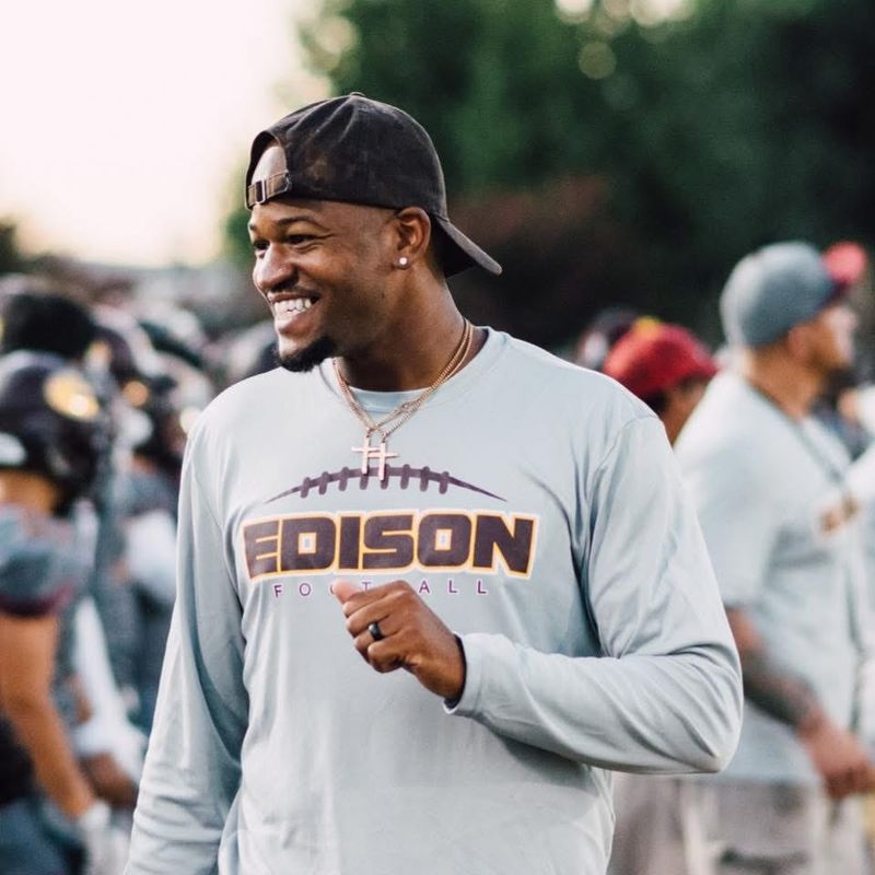Former Stagg and newly hired Edison head football coach Eric Crocker smiles at practice during his time as a defensive backs coach at Edison. Crocker previously coached at Edison in 2019, 2023 and 2024.