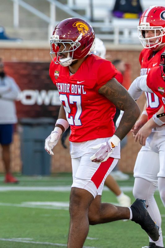 Jan 28, 2026; Mobile, AL, USA; American Team safety Kamari Ramsey (27) of USC drills during American Senior Bowl practice at Hancock Whitney Stadium. Mandatory Credit: Vasha Hunt-Imagn Images