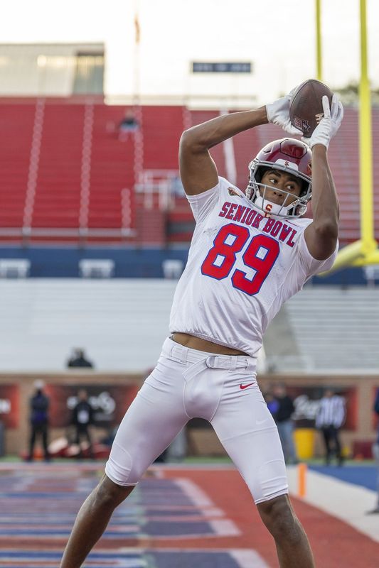 Jan 29, 2026; Mobile, AL, USA; American wide receiver Ja'Kobi Lane (89) of USC grabs a touchdown pass during American Senior Bowl practice at Hancock Whitney Stadium. Mandatory Credit: Vasha Hunt-Imagn Images