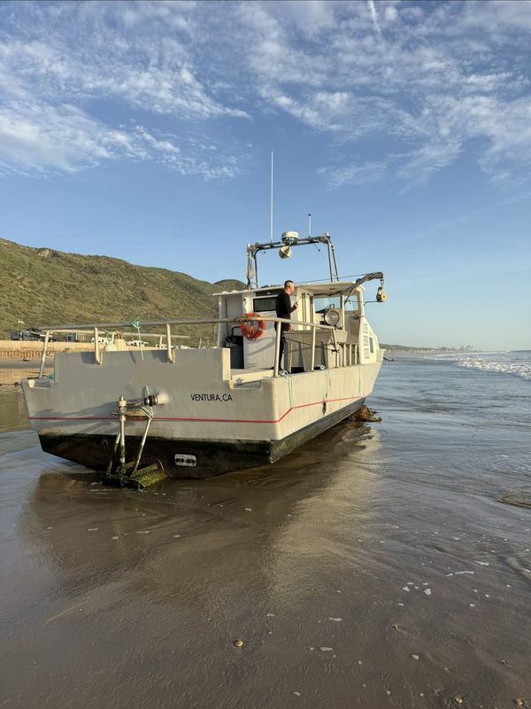 A lobster boat ran aground north of Ventura near Faria Beach on Jan. 30, 2026.