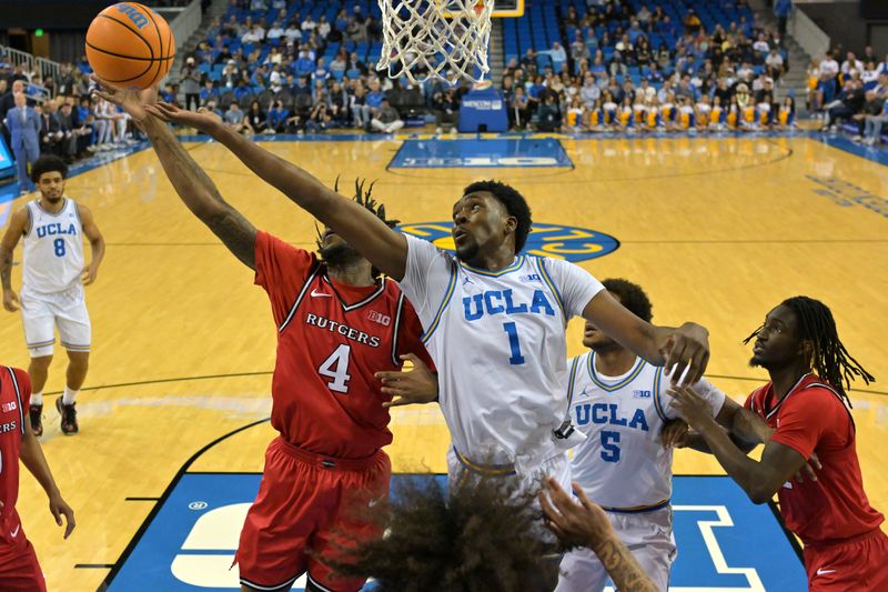 Feb 3, 2026; Los Angeles, California, USA; Rutgers Scarlet Knights forward Bryce Dortch (4) beats UCLA Bruins forward Xavier Booker (1) to a rebound in the first half at Pauley Pavilion presented by Wescom Financial. Mandatory Credit: Jayne Kamin-Oncea-Imagn Images
