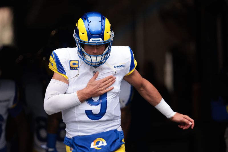 Nov 30, 2025; Charlotte, North Carolina, USA; Los Angeles Rams quarterback Matthew Stafford (9) takes the field before the game against the Carolina Panthers at Bank of America Stadium. Mandatory Credit: Scott Kinser-Imagn Images