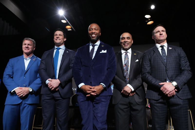 Feb 5, 2026; San Franciso, CA, USA; From left: Adam Vinatieri, Luke Kuechly, Larry Fitzgerald, Roger Craig and Drew Brees pose during a press conference introducing the NFL Hall of Fame Class of 2026 at Palace of Fine Arts. Mandatory Credit: Kirby Lee-Imagn Images