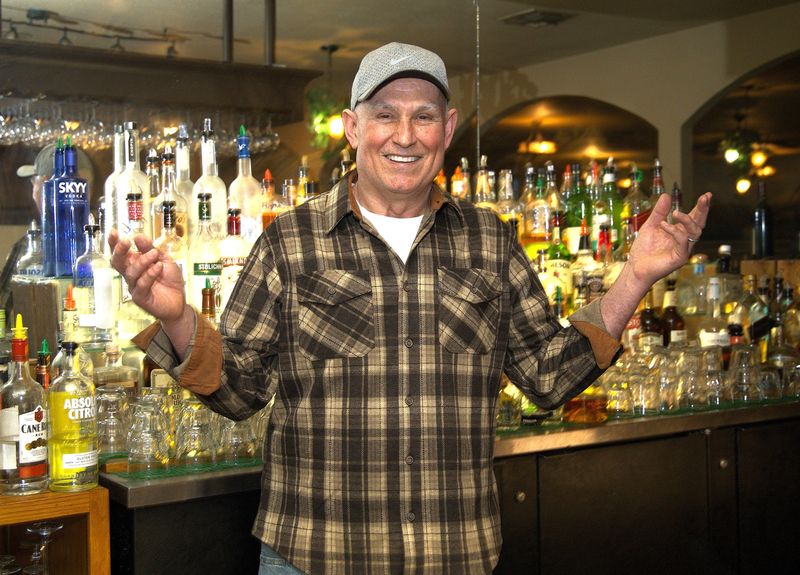 Jim Dad, who co-owns Nello’s Place in Redding with his wife Rosa, stands in front of the Italian restaurant’s back bar on Thursday, Feb. 5, 2026.