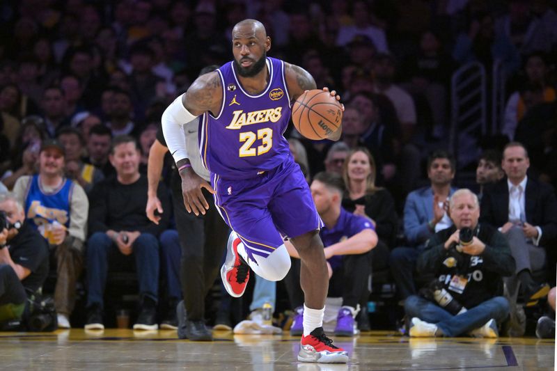 Feb 12, 2026; Los Angeles, California, USA; Los Angeles Lakers forward LeBron James (23) handles the ball in the first half against the Dallas Mavericks at Crypto.com Arena. Mandatory Credit: Jayne Kamin-Oncea-Imagn Images
