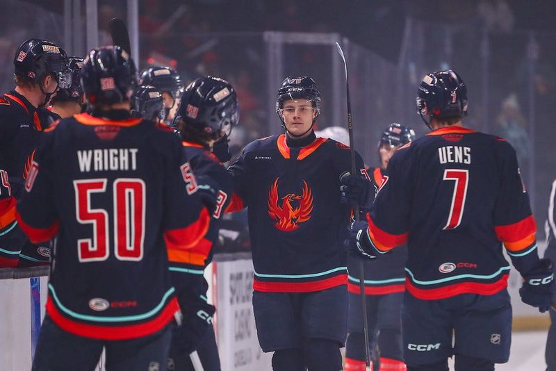 Coachella Valley Firebirds forward Andrei Loshko celebrates a goal with teammates during a 6-1 win over the Tucson Roadrunners inside Acrisure Arena in Palm Desert, California on Feb. 13, 2026.