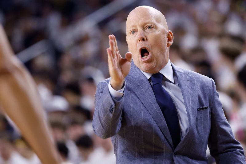 Feb 14, 2026; Ann Arbor, Michigan, USA; UCLA Bruins head coach Mick Cronin reacts in the first half against the Michigan Wolverines at Crisler Center. Mandatory Credit: Rick Osentoski-Imagn Images
