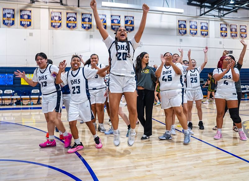 Desert Hot Springs' Laeloni Flenor jumps in celebration with teammates after winning their second-round Division 9 CIF-SS game in Desert Hot Springs, Calif., Saturday, Feb. 14, 2026.