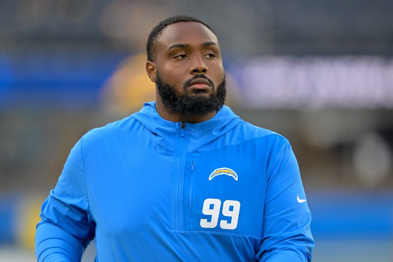 Nov 9, 2025; Inglewood, California, USA; Los Angeles Chargers defensive tackle Jamaree Caldwell (99) looks on during warmups before the game against the Pittsburgh Steelers at SoFi Stadium. Mandatory Credit: Jayne Kamin-Oncea-Imagn Images