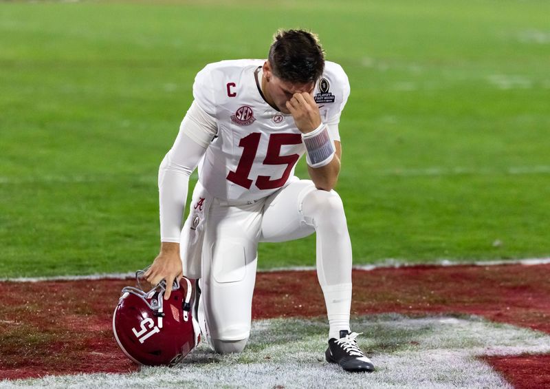 Dec 19, 2025; Norman, OK, USA; Alabama Crimson Tide quarterback Ty Simpson (15) reacts prior to the game against the Oklahoma Sooners during the CFP National Playoff First Round at Gaylord Family Oklahoma Memorial Stadium. Mandatory Credit: Mark J. Rebilas-Imagn Images