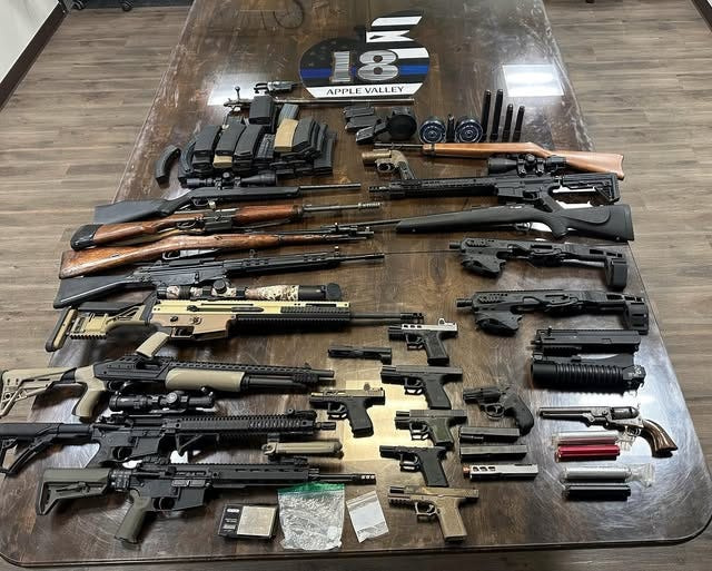 Investigators seized a cache of guns, destructive devices and drugs, along with three stolen cars, from a property in the 10400 block of Fourth Avenue in Hesperia on Friday, Feb. 20, 2026.