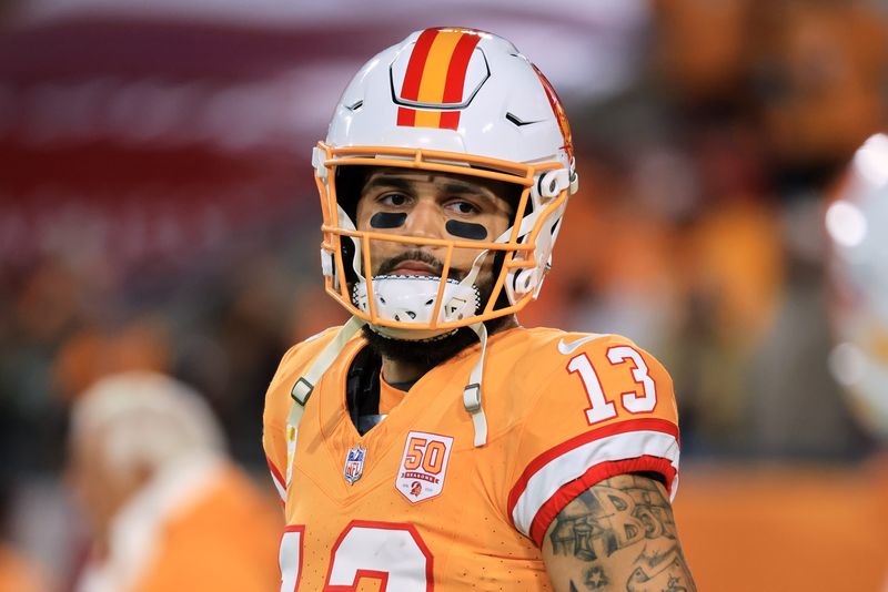 Dec 11, 2025; Tampa, Florida, USA; Tampa Bay Buccaneers wide receiver Mike Evans (13) looks on during warmups before the game against the Atlanta Falcons at Raymond James Stadium. Mandatory Credit: Kim Klement Neitzel-Imagn Images
