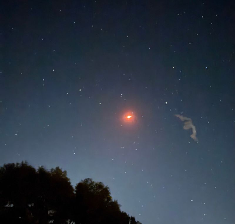 A Falcon 9 rocket can be seen in the sky after launching Feb. 21 from the Vandenberg Space Force Base.