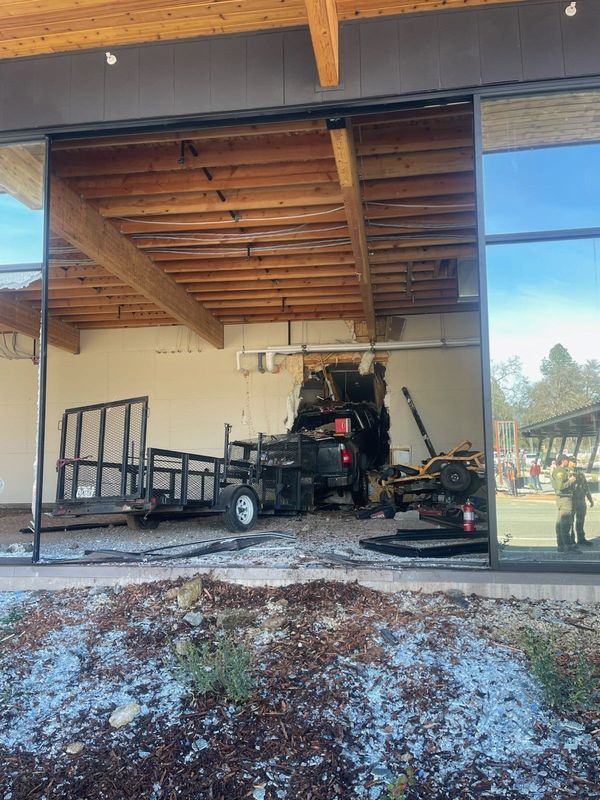 Pickup truck towing a trailer crashed through a vacant commercial space and an apartment unit at Cascade Village in Shasta Lake on Friday, Feb. 20, 2026.
