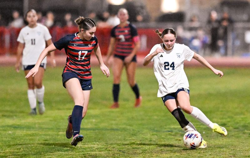 Tulare Western's Lundin Rogers pressures El Diamante's Poppy Cheney in a Central Section Division II girls soccer championship on Wednesday, February 25, 2026.