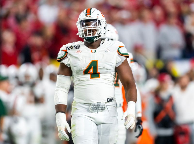 Jan 19, 2026; Miami Gardens, FL, USA; Miami Hurricanes defensive lineman Rueben Bain Jr. (4) against the Indiana Hoosiers during the College Football Playoff National Championship game at Hard Rock Stadium. Mandatory Credit: Mark J. Rebilas-Imagn Images