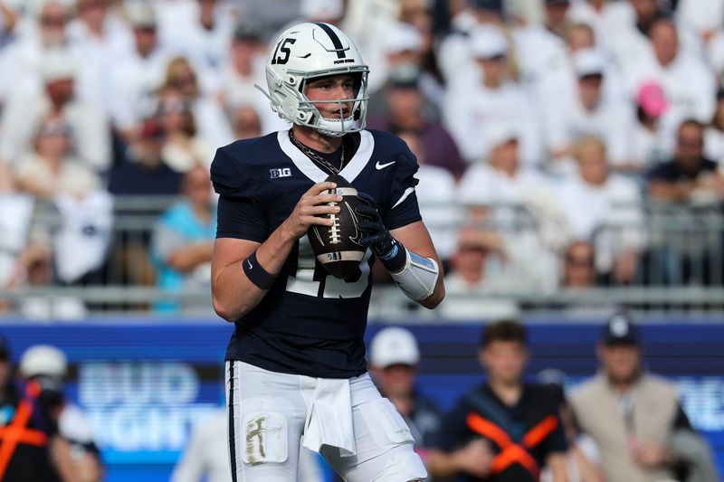 Oct 11, 2025; University Park, Pennsylvania, USA; Penn State Nittany Lions quarterback Drew Allar (15) drops back in the pocket during the first quarter against the Northwestern Wildcats at Beaver Stadium. Mandatory Credit: Matthew O'Haren-Imagn Images