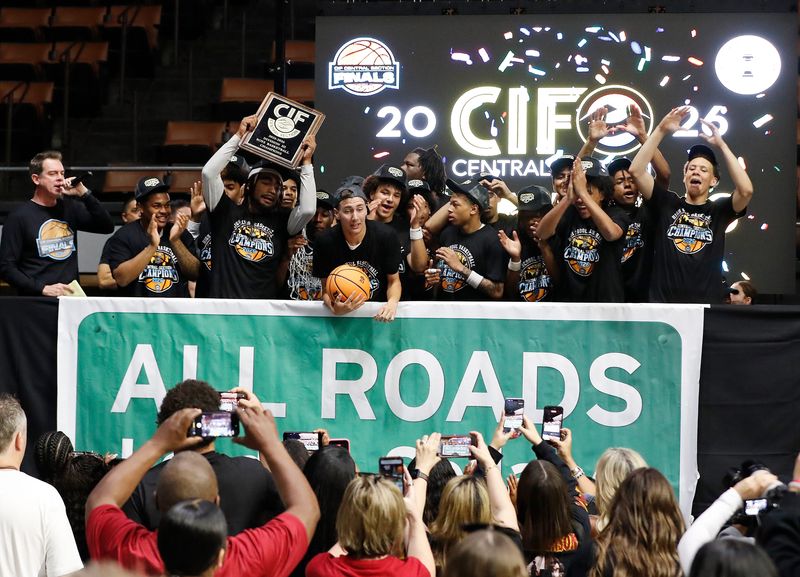Tulare Union celebrates a win against Central Valley Christian in a Central Section Division III high school boys basketball championship Saturday, February 28, 2026 at Selland Arena in Fresno.