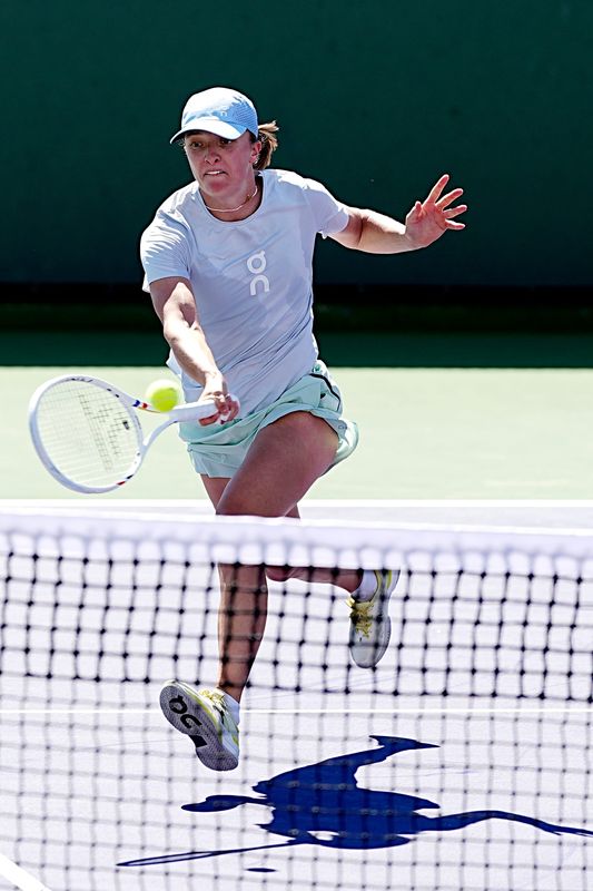 Iga Swiatek practices during the BNP Paribas Open at the Indian Wells Tennis Garden in Indian Wells, Calif., on Tuesday, March 3, 2026.