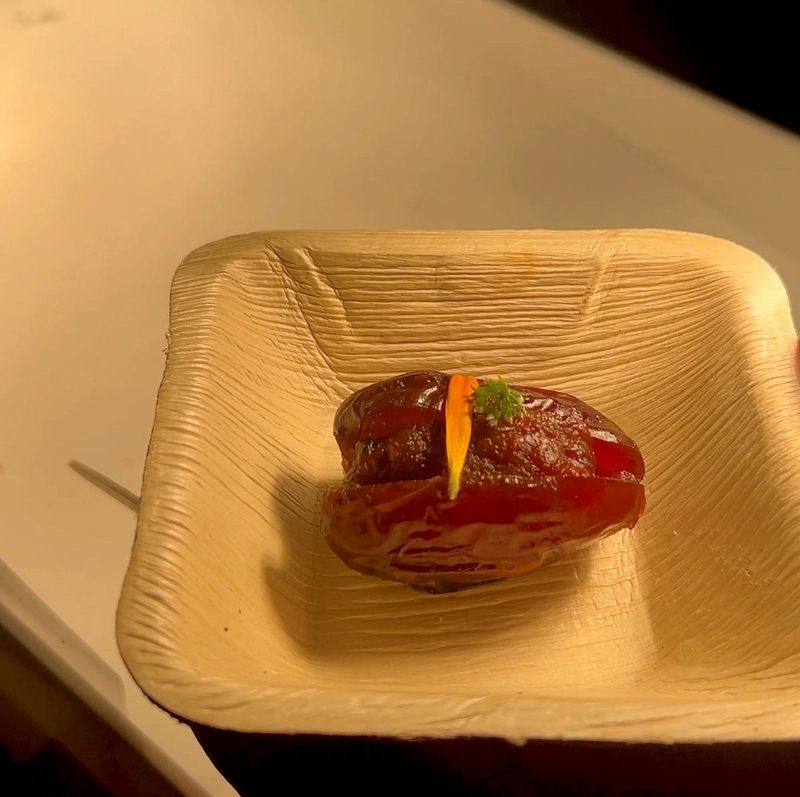 This duck merguez-stuffed date was a flavor explosion at the 2026 Taste of Tennis Indian Wells.