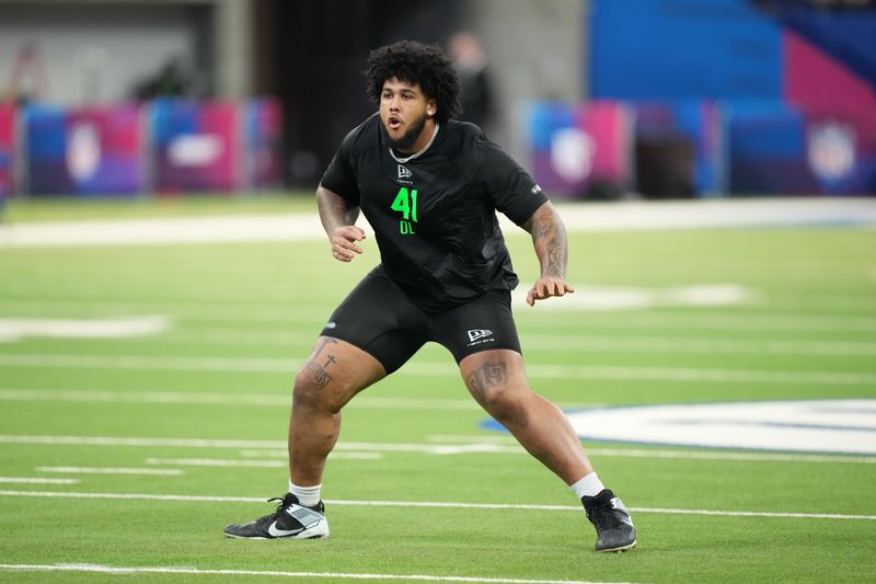 Mar 1, 2026; Indianapolis, IN, USA; Alabama offensive lineman Kadyn Proctor (OL41) during the NFL Scouting Combine at Lucas Oil Stadium. Mandatory Credit: Kirby Lee-Imagn Images