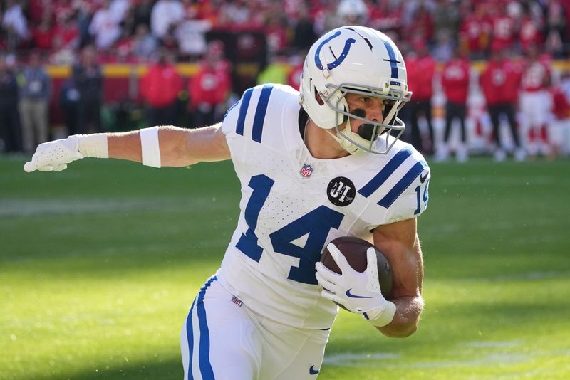 Nov 23, 2025; Kansas City, Missouri, USA; Indianapolis Colts wide receiver Alec Pierce (14) makes a catch against the Kansas City Chiefs in the second half at GEHA Field at Arrowhead Stadium. Mandatory Credit: Denny Medley-Imagn Images