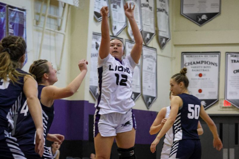 Redding Christian senior Cailee Bowers takes a three-point shot in a game against Forest Lake Christian. Bowers hit four three-pointers to help the Lions defeat the Falcons 52-26. March 7, 2026.