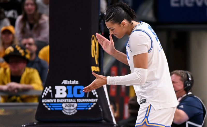 Mar 8, 2026; Indianapolis, IN, USA; UCLA Bruins center Lauren Betts (51) celebrates after a play against the Iowa Hawkeyes during the first half at Gainbridge Fieldhouse. Mandatory Credit: Robert Goddin-Imagn Images
