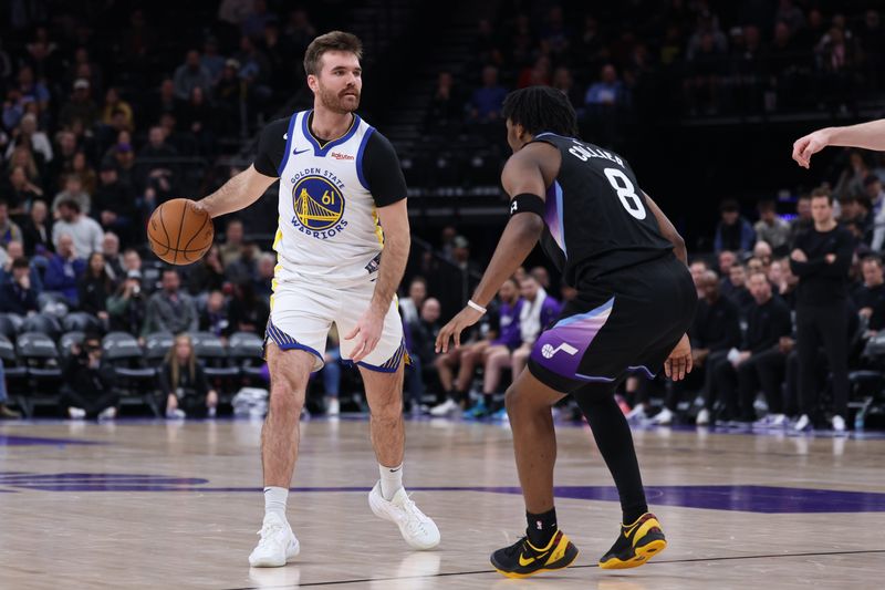 Jan 28, 2026; Salt Lake City, Utah, USA; Golden State Warriors guard Pat Spencer (61) looks for the play against Utah Jazz guard Isaiah Collier (8) during the second half at Delta Center. Mandatory Credit: Rob Gray-Imagn Images