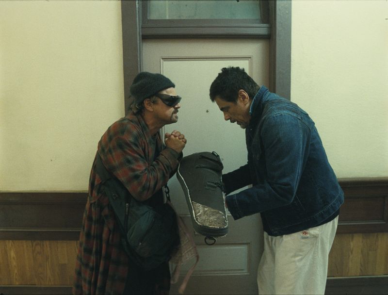 Bob Anderson (Leonardo DiCaprio, left) gets help from wise sensei Sergio (Benicio Del Toro) in "One Battle After Another."