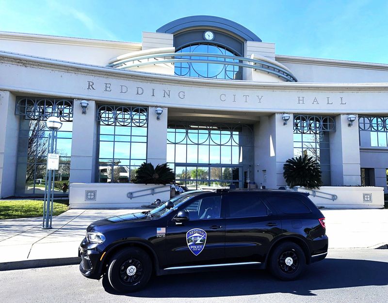A Redding police vehicle sits parked outside City Hall on March 9, 2026.