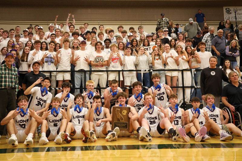 The Redding Christian boys basketball team and its fans celebrate the Lions 2026 CIF NorCal Division VI championship win over St. Vincent de Paul. March 10, 2026.