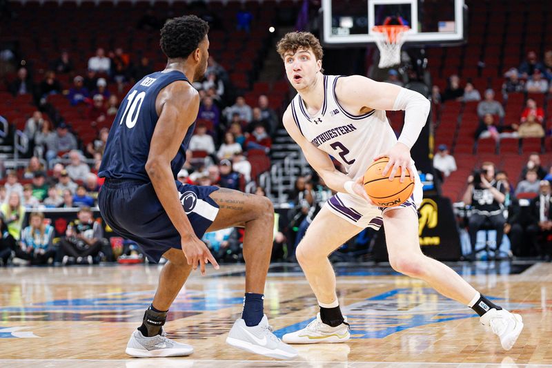 Mar 10, 2026; Chicago, IL, USA; Northwestern Wildcats forward Nick Martinelli (2) drives to the basket against Penn State Nittany Lions forward Josh Reed (10) during the second half at United Center. Mandatory Credit: Kamil Krzaczynski-Imagn Images