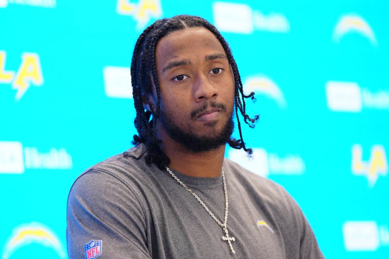 May 20, 2025; El Segundo, CA, USA; Los Angeles Chargers linebacker Del'Shawn Phillips looks on at press conference during offseason workouts at The Bolt. Mandatory Credit: Kirby Lee-Imagn Images